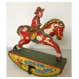 Tin Ride Em Cowboy Windup Toy 6"