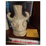 Pottery face pitcher