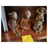 Boy, girl and monkeys figures