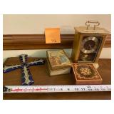 Boxes, coins, cross, clock
