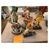 5 clown figurines