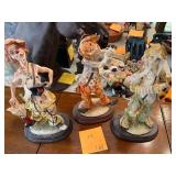 3 clown figurines