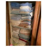 Closet contents (towels) and hamper