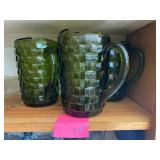 3 green glass pitchers