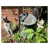 2 concrete statues and light birdbath