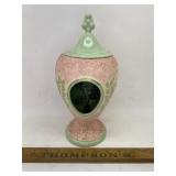 Ceramic urn with visible painting on inside