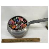 Pot full of bottle caps