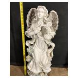 Angel statue with wind chime