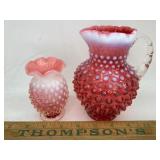 2 red hobnail vases