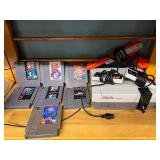 Nintendo 8 games 2 controllers, gun works great