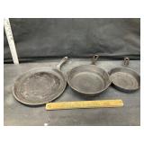 3 cast iron pans