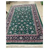 6ft by 10ft hand woven rug