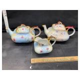 3 antique pitchers