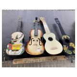 4 vintage toy guitars