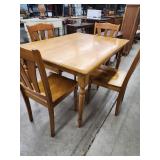 Dining table with four chairs