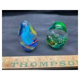 2 glass paper weights