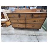 Mid century dresser with mirror and bed