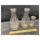 3 vintage milk bottles