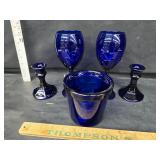 Cobalt blue candle hokders glasses and jar