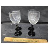 4 black stem wine glasses