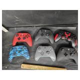 6 xbox controllers