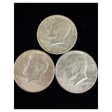 3 Kennedy silver half dollar coins