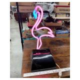 Neon flamingo working