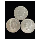 3 Kennedy silver half dollar coins