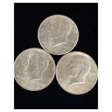 3 Kennedy silver half dollar coins
