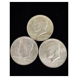 3 Kennedy silver half dollar coins