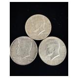 3 Kennedy silver half dollar coins