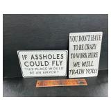 2 metal signs