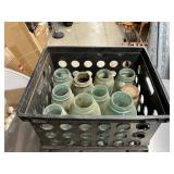 Crate of blue jars