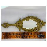 Ornate brass dresser mirror