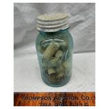 Vintage blue jar with wine corks