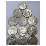 11 Kennedy half dollars and 1 Susan dollar