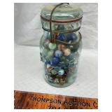 Vintage blue jar with marbles some uranium glass
