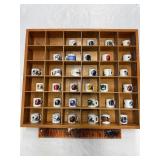 Collectible ceramic NFL mugs with shelf