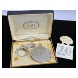 1899 O Morgan silver dollar on keychain