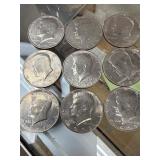 9 Kennedy half dollars