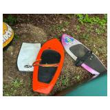 2 knee boards and a boogie board