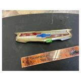 1957 Chevrolet Belair trunk emblem