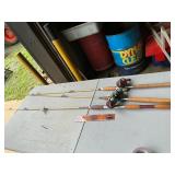 3 rods with vintage Penn reels