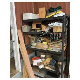 Metal shelf with contents