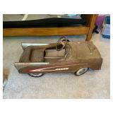 Vintage jet hawk peddle car