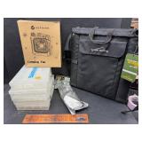 Folding seat, tackle boxes, camp fan, rod holder