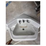 Corner porcelain sink
