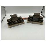 Metal cars with marble base