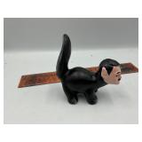 Cast iron skunk