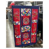 Vintage folk art hanging quilt